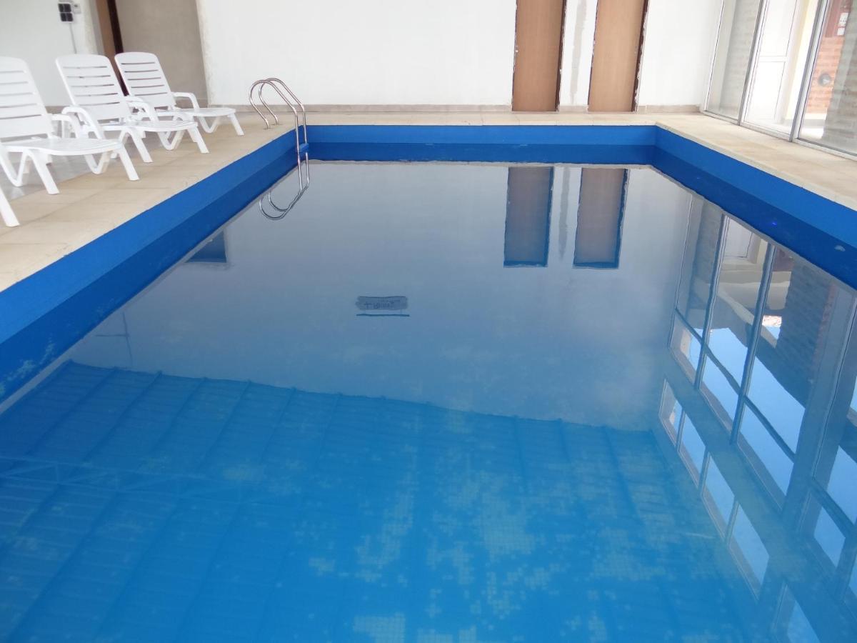 Rimini Hotel Las Grutas Bagian luar foto