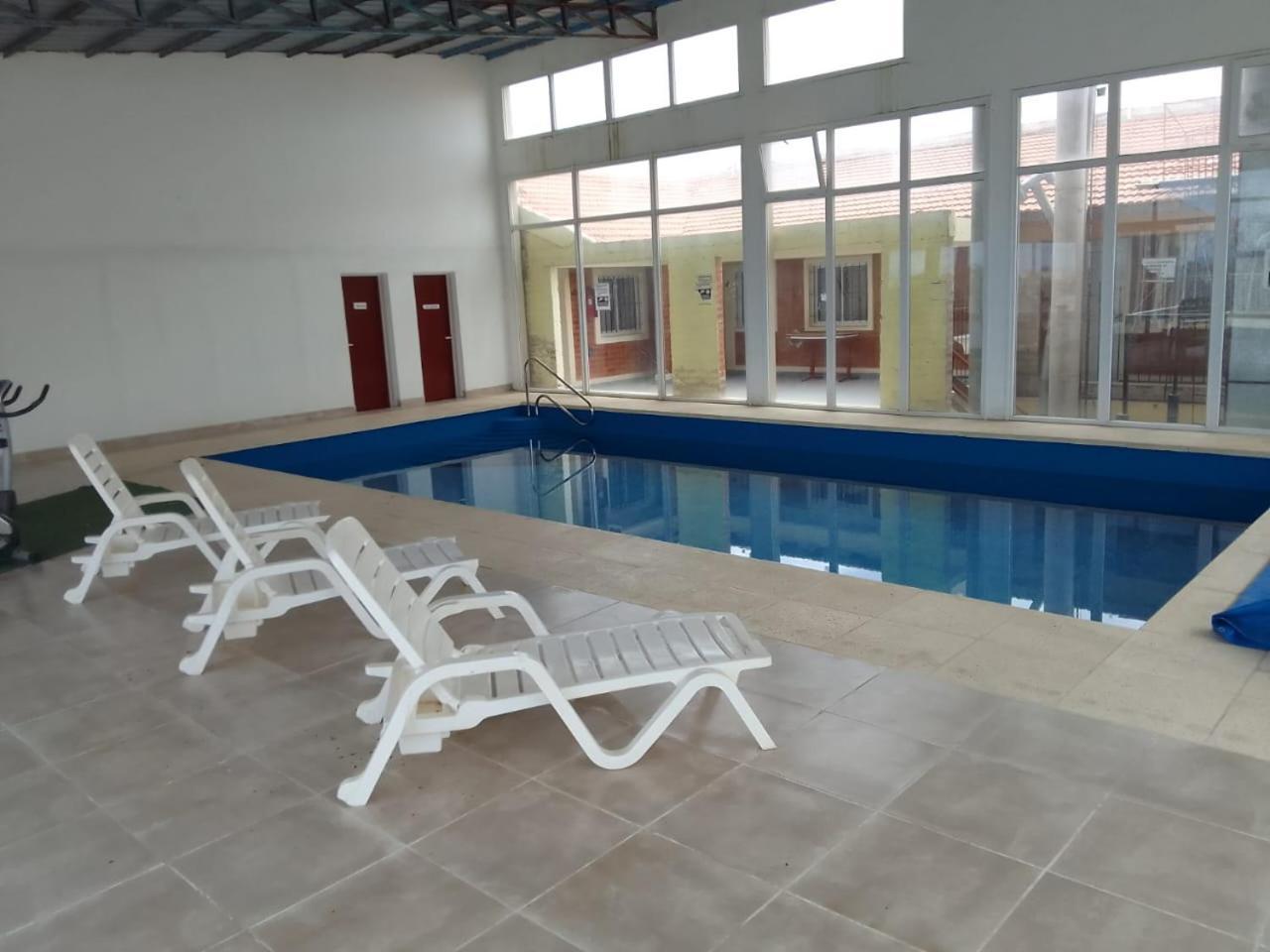 Rimini Hotel Las Grutas Bagian luar foto